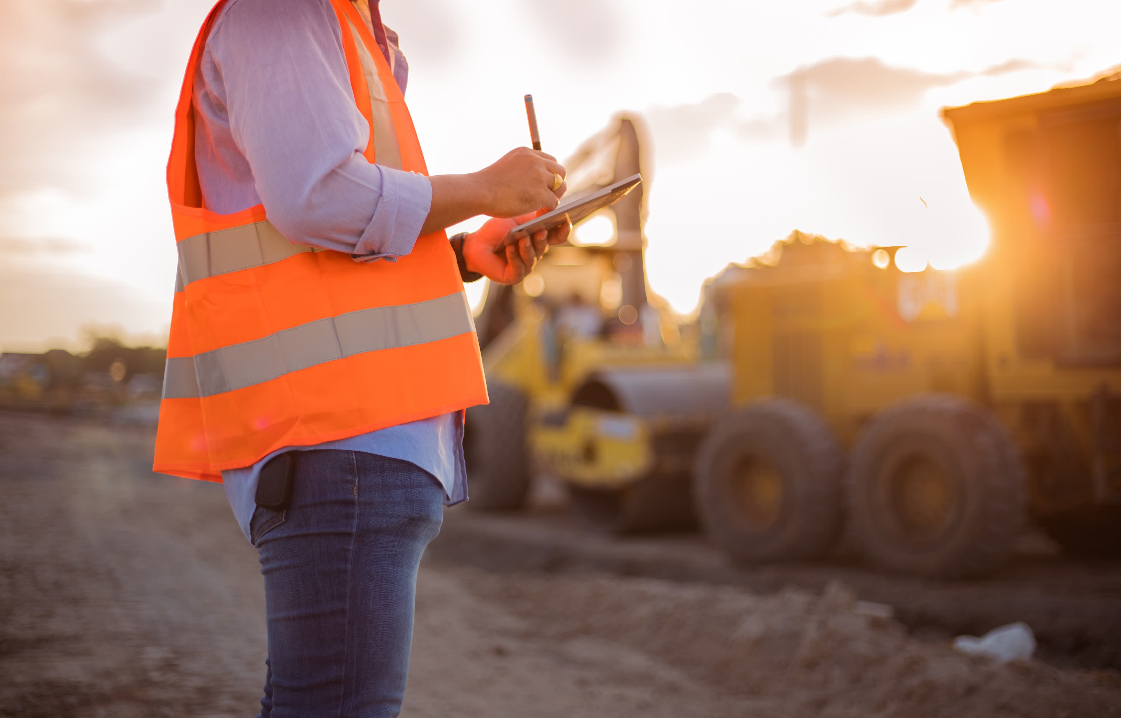 Worker on an industrial site wearing safety gear